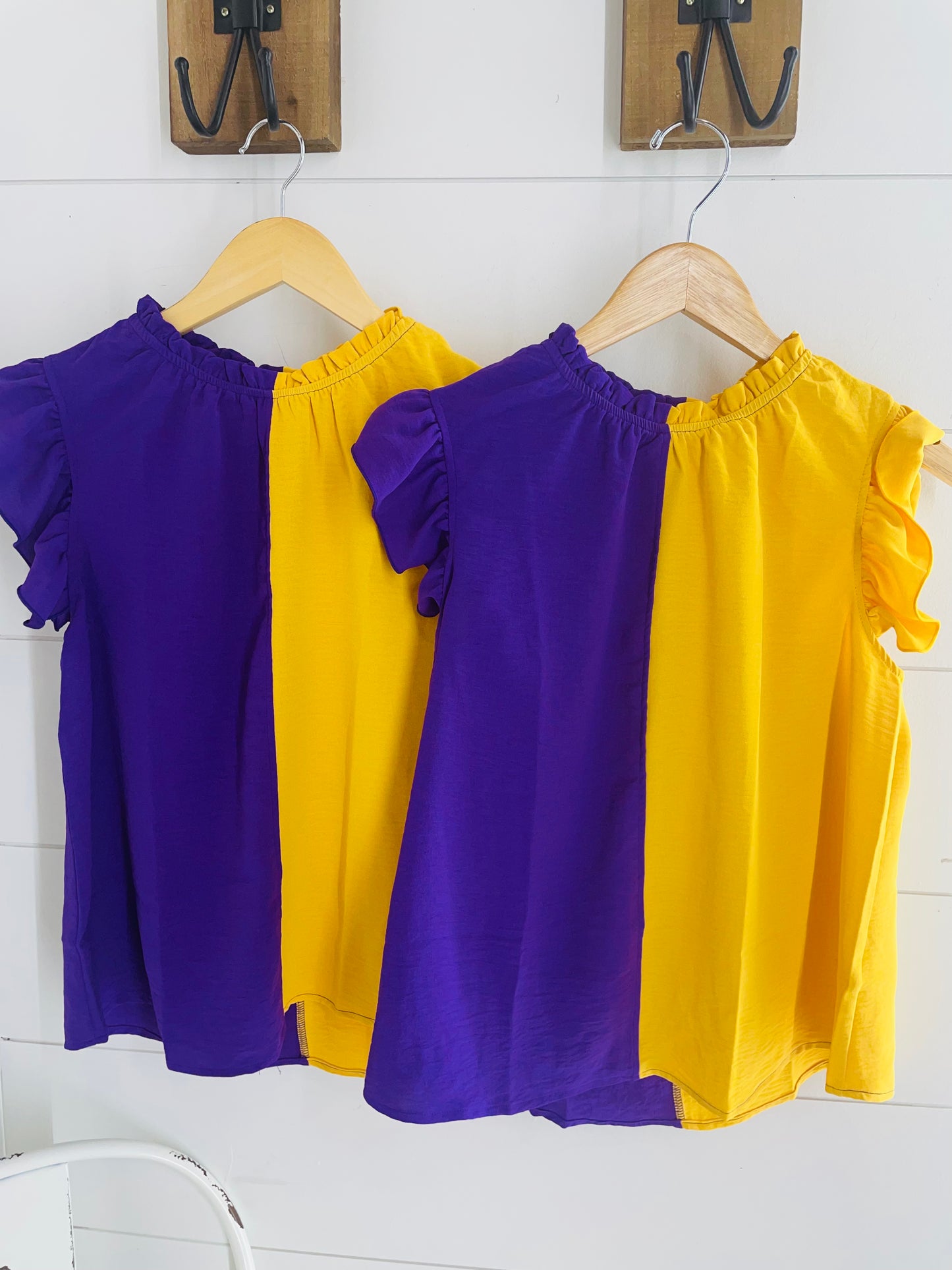 Love Purple. Live Gold. Top